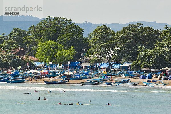 Strand  Küste  Stadt  Boot  Urlaub  angeln  Südostasien  Asien  Indonesien  Java  Süden