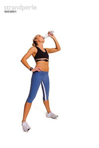 Studioaufnahme  Wasser  Frau  Kleidung  jung  trinken  Sport