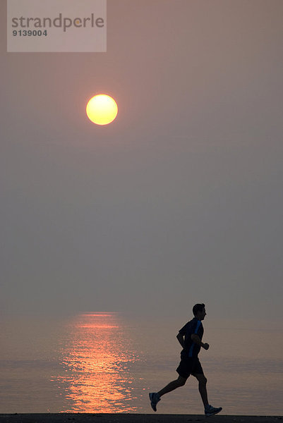 Mann  Sonnenaufgang  Kai  joggen  Ontario