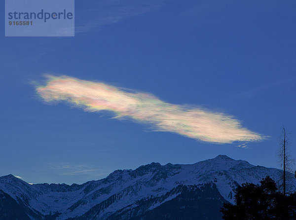 Irisierende Wolke über dem Pirchkogel  Tirol  Österreich