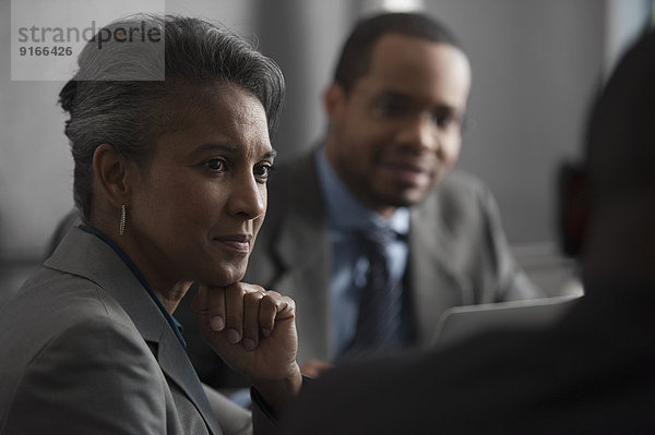 Business people talking in meeting