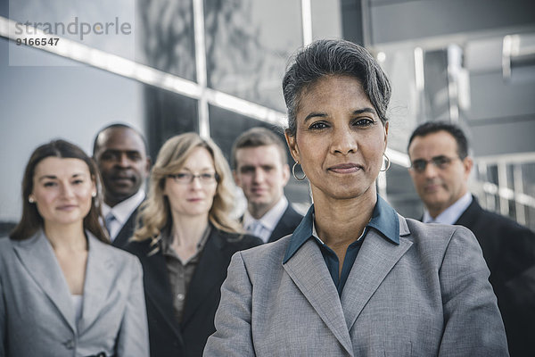 Business people smiling outdoors