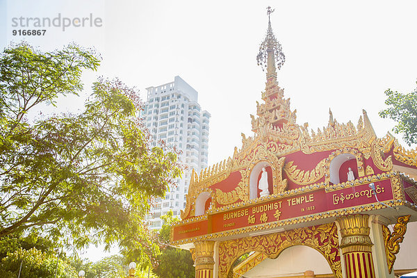 Dhammikarama Burmese temple under sunny sky  George Town  Penang  Malaysia