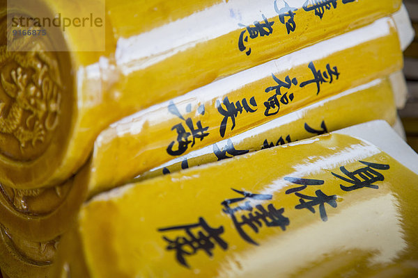 Close up of Chinese characters on scrolls