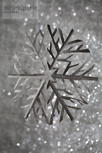 Close up of silver snowflake