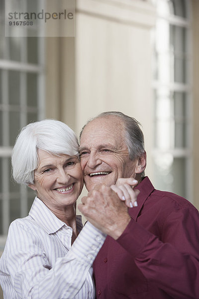 Senior Caucasian couple dancing