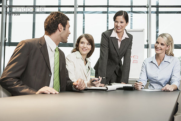 Business people talking in meeting