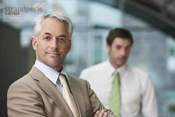 Businessman smiling in office