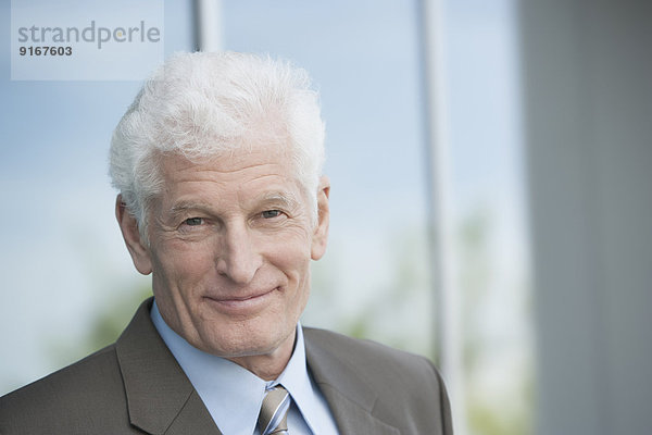 Caucasian businessman smiling