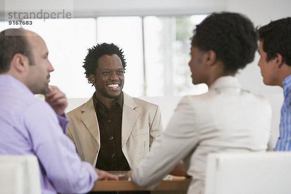 Business people talking in meeting