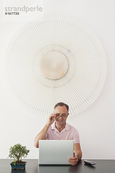 Businessman working at desk in office