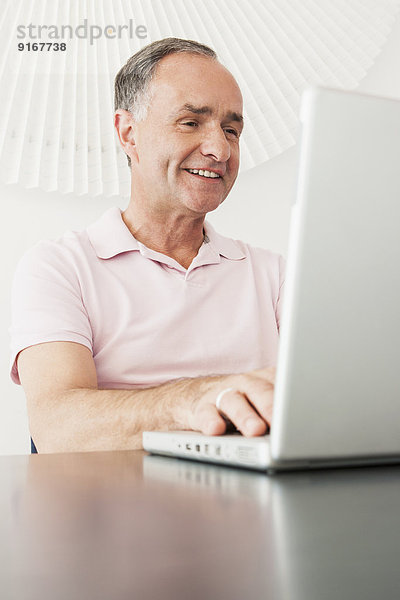 Businessman working at desk in office