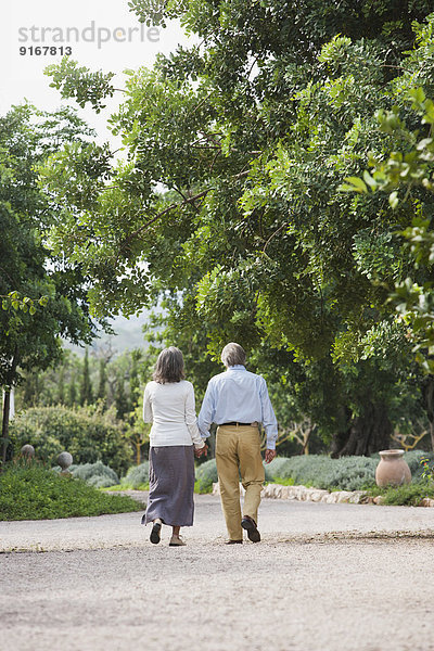 Couple walking together outdoors