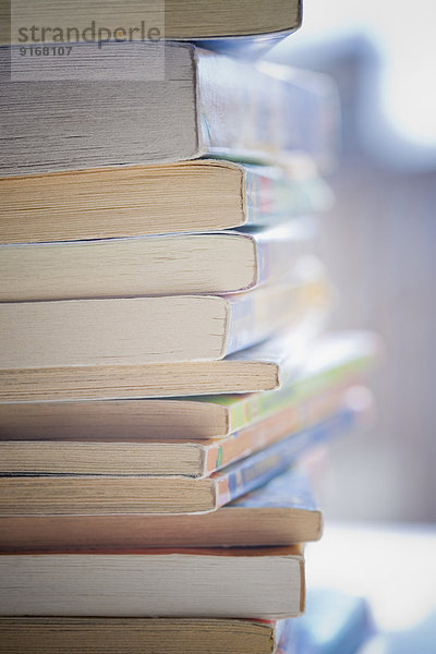 Close up of paperback book spines