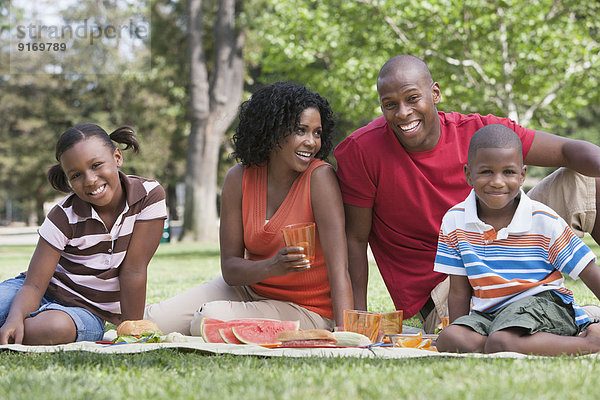 Family having picnic in park