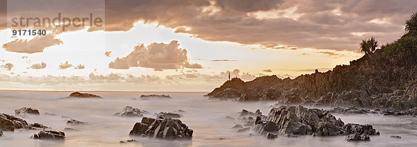Australia  New South Wales  Tweed Shire  break of dawn at the rocky shore of Hastings Point