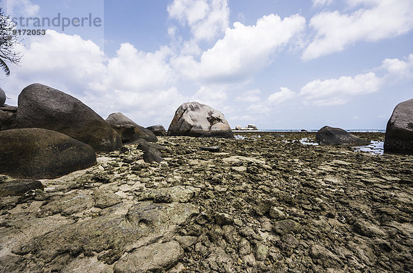 Indonesia  Riau Islands  Bintan  Nikoi Island  Beach with granite blocks