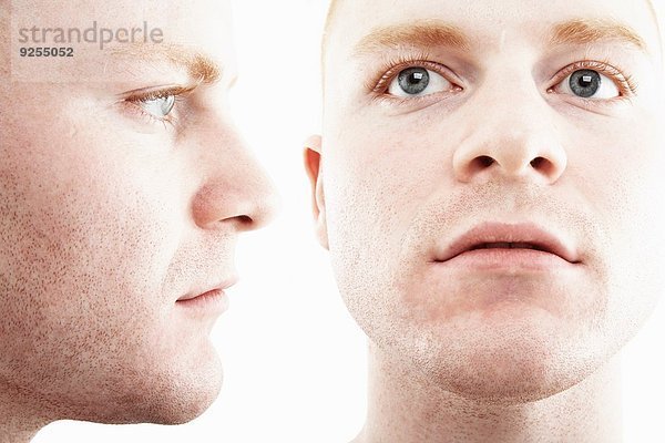 Zweifache Mehrfachbelichtung von Gesicht und Profil des jungen Mannes