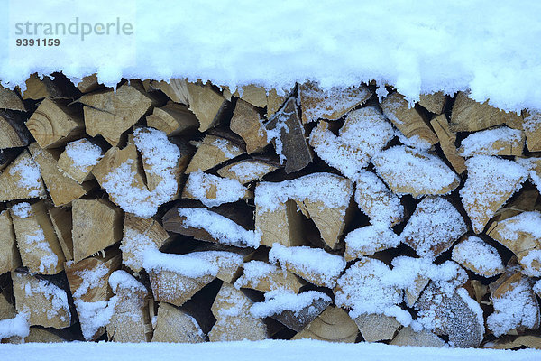 Vereinigte Staaten von Amerika USA Winter Amerika Holz Holzstoß Alaska Schnee