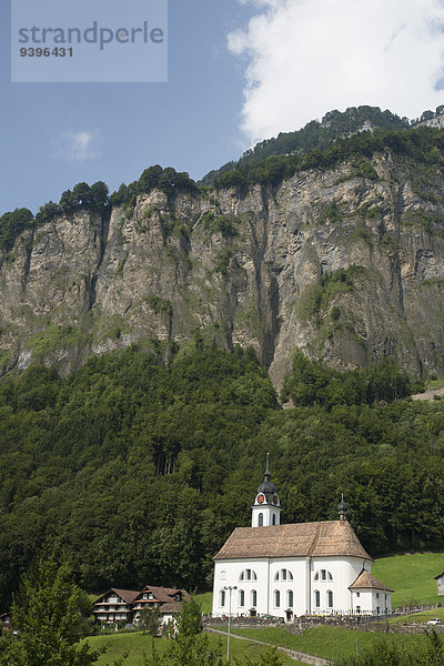 Felsbrocken Europa Steilküste Kirche Schweiz