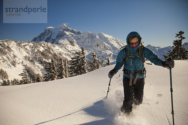 Woman snowshoeing.