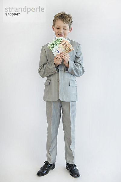 Portrait Papier lächeln Junge - Person halten Geld