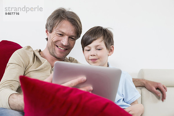 benutzen lächeln Menschlicher Vater Sohn Tablet PC