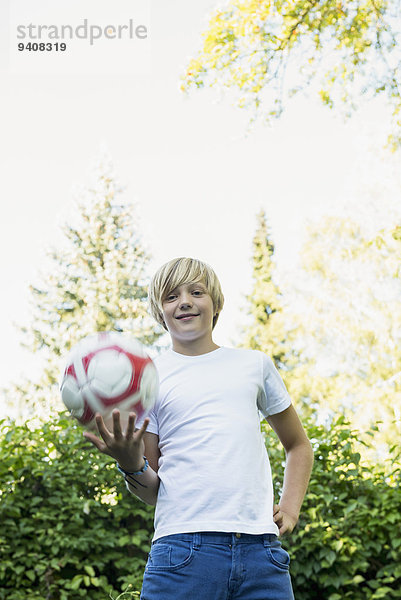 Portrait lächeln Junge - Person jung Ball Spielzeug