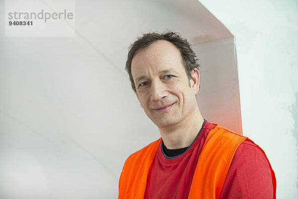 bauen Portrait lächeln arbeiten Gebäude neu