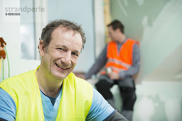 bauen Portrait arbeiten Gebäude neu