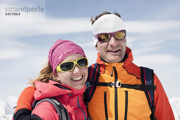 Portrait Skibrille Winter lächeln Schutzbrille Ski