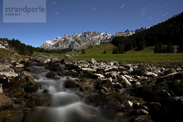 Der Alpstein mit Gebirgsbach im Vollmondlicht in den Schweizer Ostalpen  Schweiz  Europa