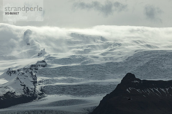 Island  Jokurlsarlon  Berge und Wolken