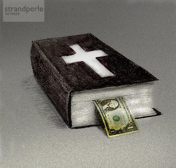 Dollarschein hängt aus einer Bibel