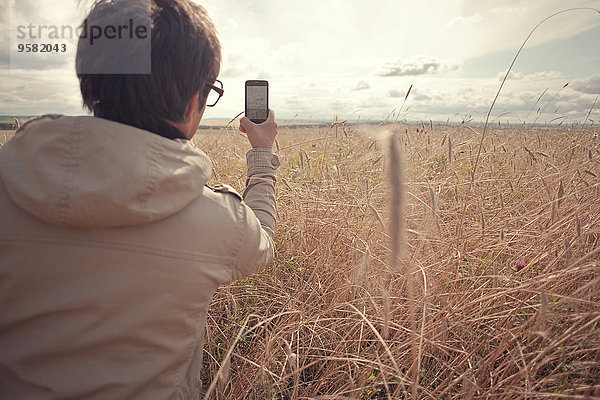 Handy Ländliches Motiv ländliche Motive Mann Feld fotografieren