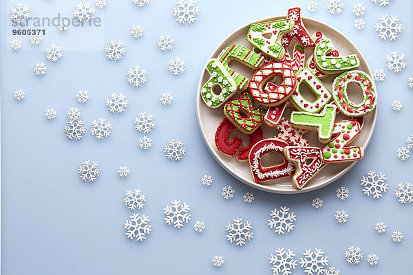Form Formen über Hintergrund Weihnachten Teller blau Zucker Schneeflocke Ansicht Keks