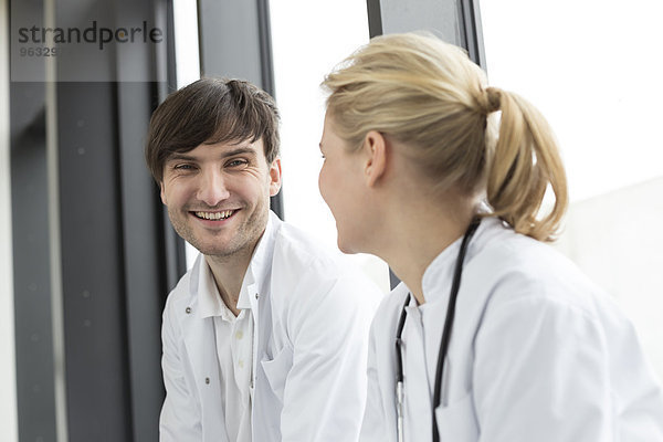 Doctors having conversation  smiling