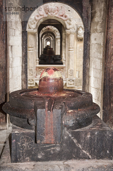 Shiva lingam  stone phallus and female counterpart  Pashupatinath temple