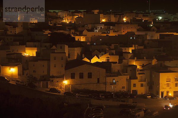 View of whitewashed village houses at night