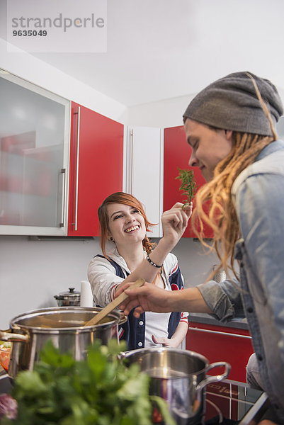 Young couple cooking in the kitchen