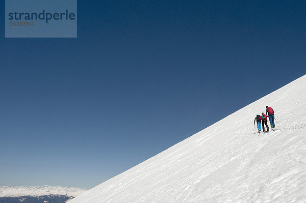 Men on a ski tour