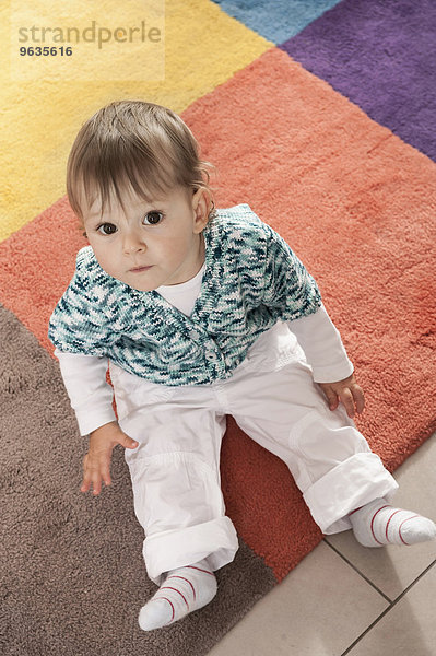 Portrait small child baby girl carpet cute