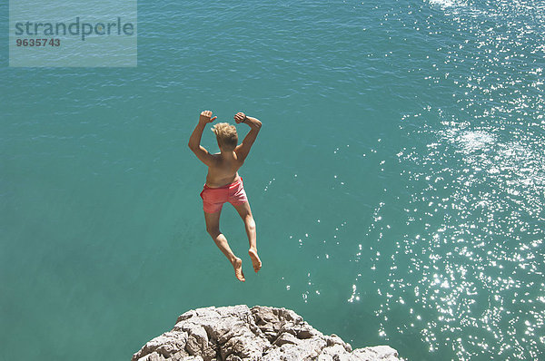 Teenager water cliff sunshine summer holiday jump