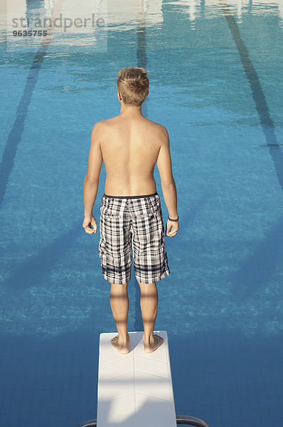 Swimming pool boy diving board fun holiday