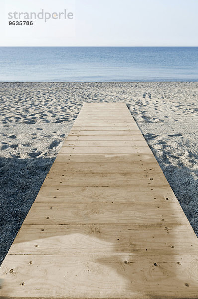 Beach wooden boardwalk Italy ocean empty