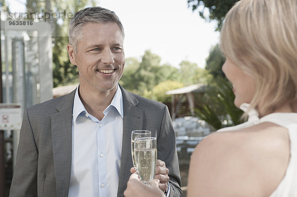 Couple party date attractive champagne toasting