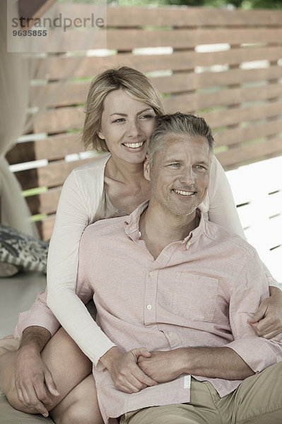 Rendezvous middle aged couple relaxing gazebo