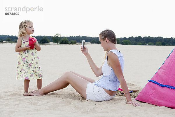 Fotografie nehmen Strand Tochter Mutter - Mensch