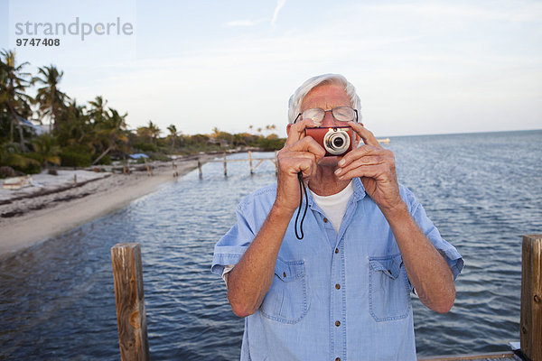 Europäer Mann Fotografie nehmen Strand