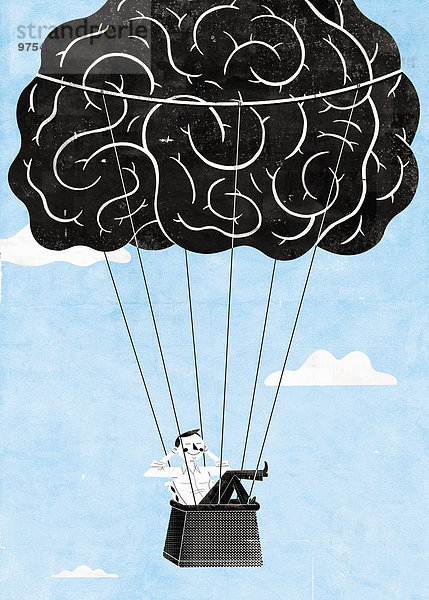 Glücklicher Mann entspannt in einem Gehirn-Heißluftballon